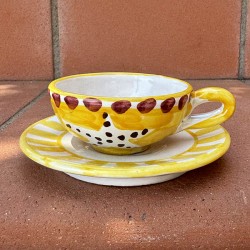 Coffee cup with yellow...